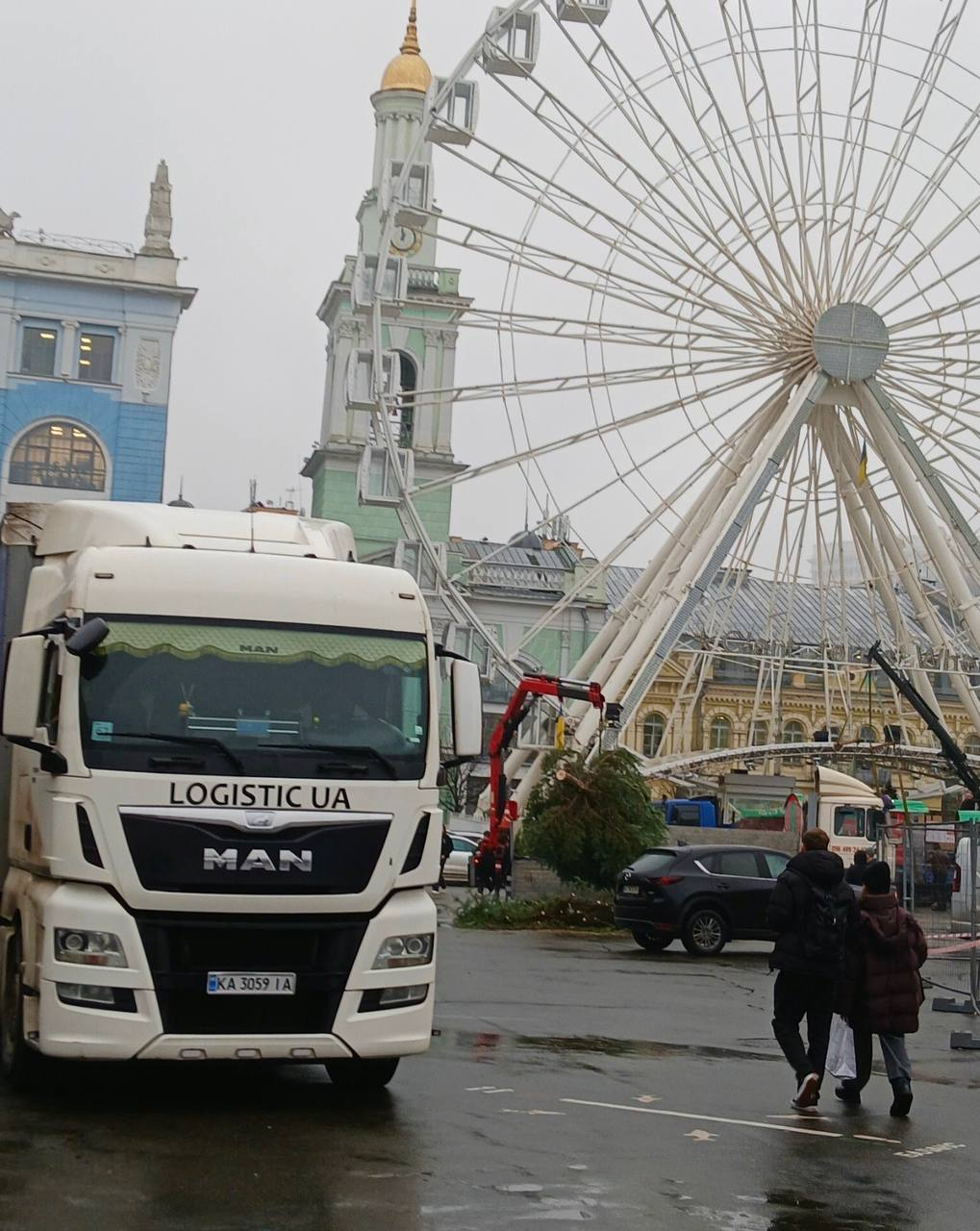 LOGISTIC UA truck at city ferris wheel